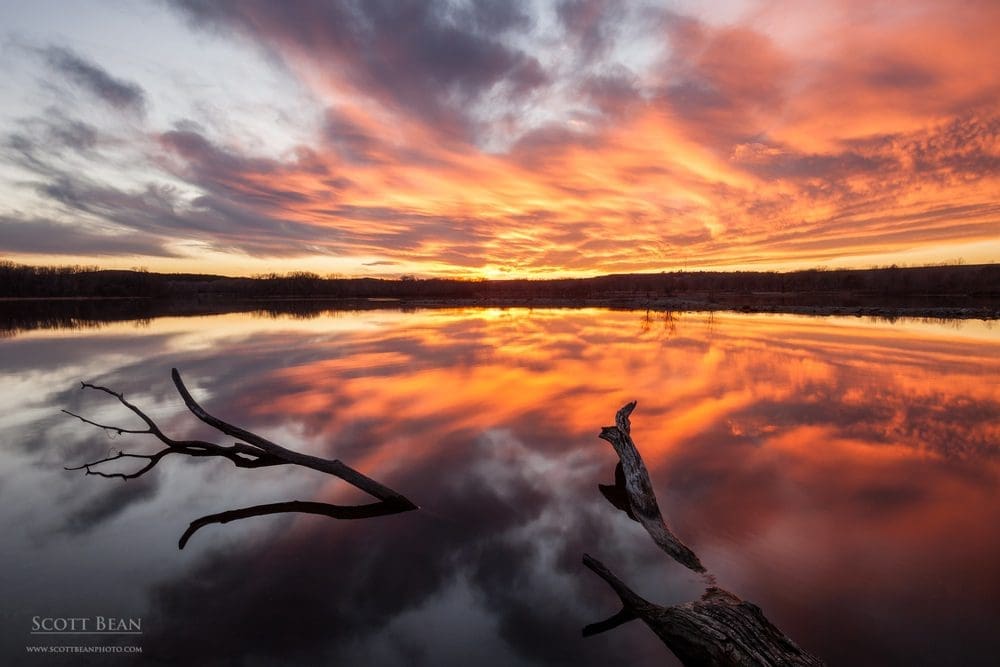Sunset reflected in the River Pond area of Tuttle Creek Lake